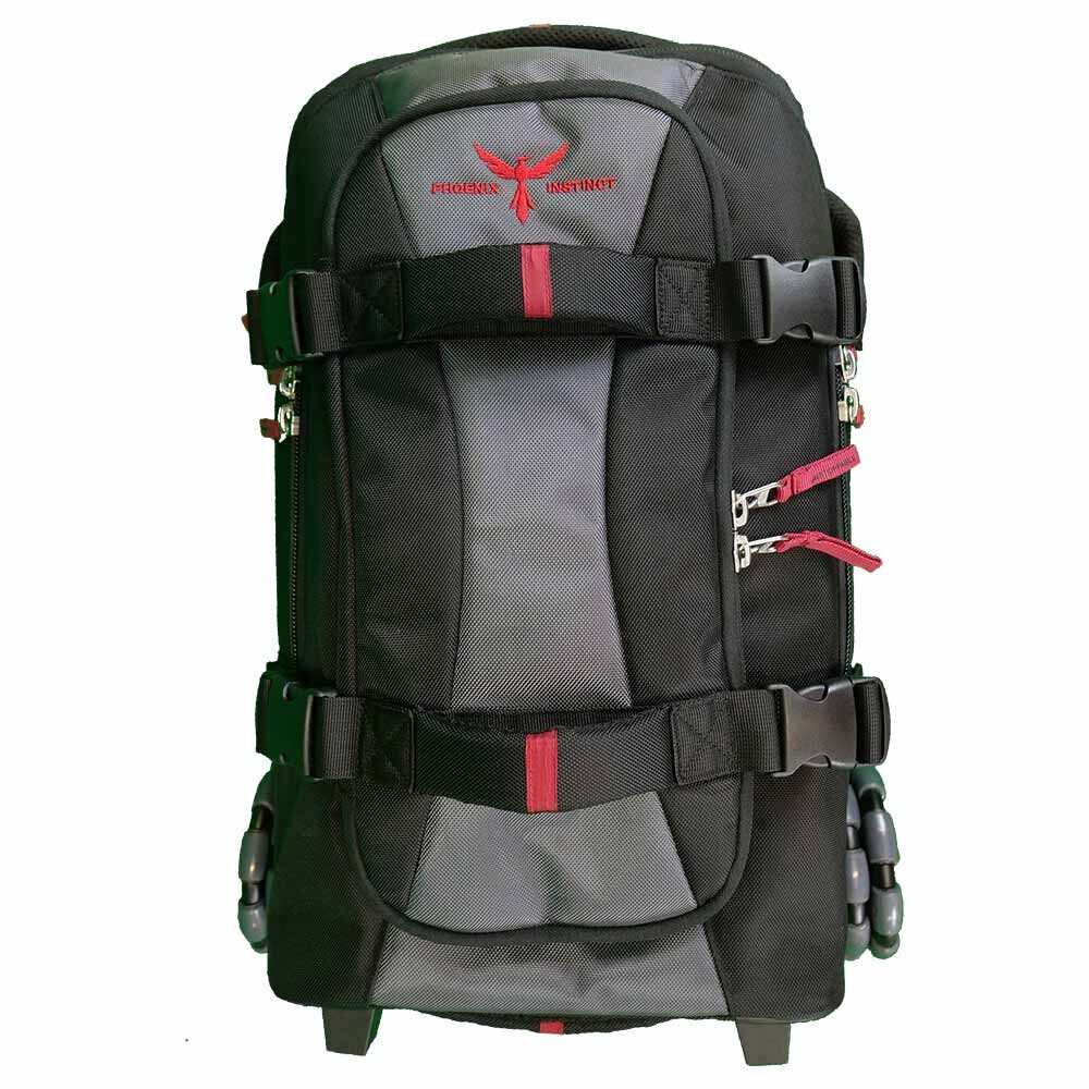 Profile image of a 'Phoenix Instinct' compact bag, a black, wheeled bag with multiple compartments, and a large section of the middle of the bag coloured a silvery grey instead. The words 'Phoenix Instinct' along with a stylized image of a phoenix in the middle of two words, are emblazoned in orange near the top of front compartment of the bag.